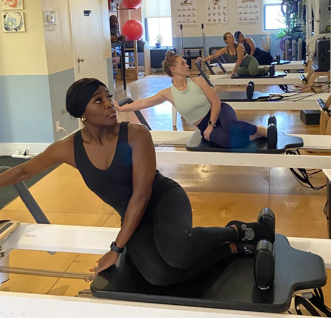 Side bends on the reformers during a class