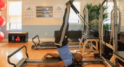 A shoulder stand on the reformer